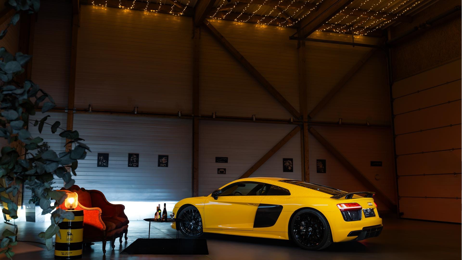 Yellow Audi R8 photographed in an industrial hangar
