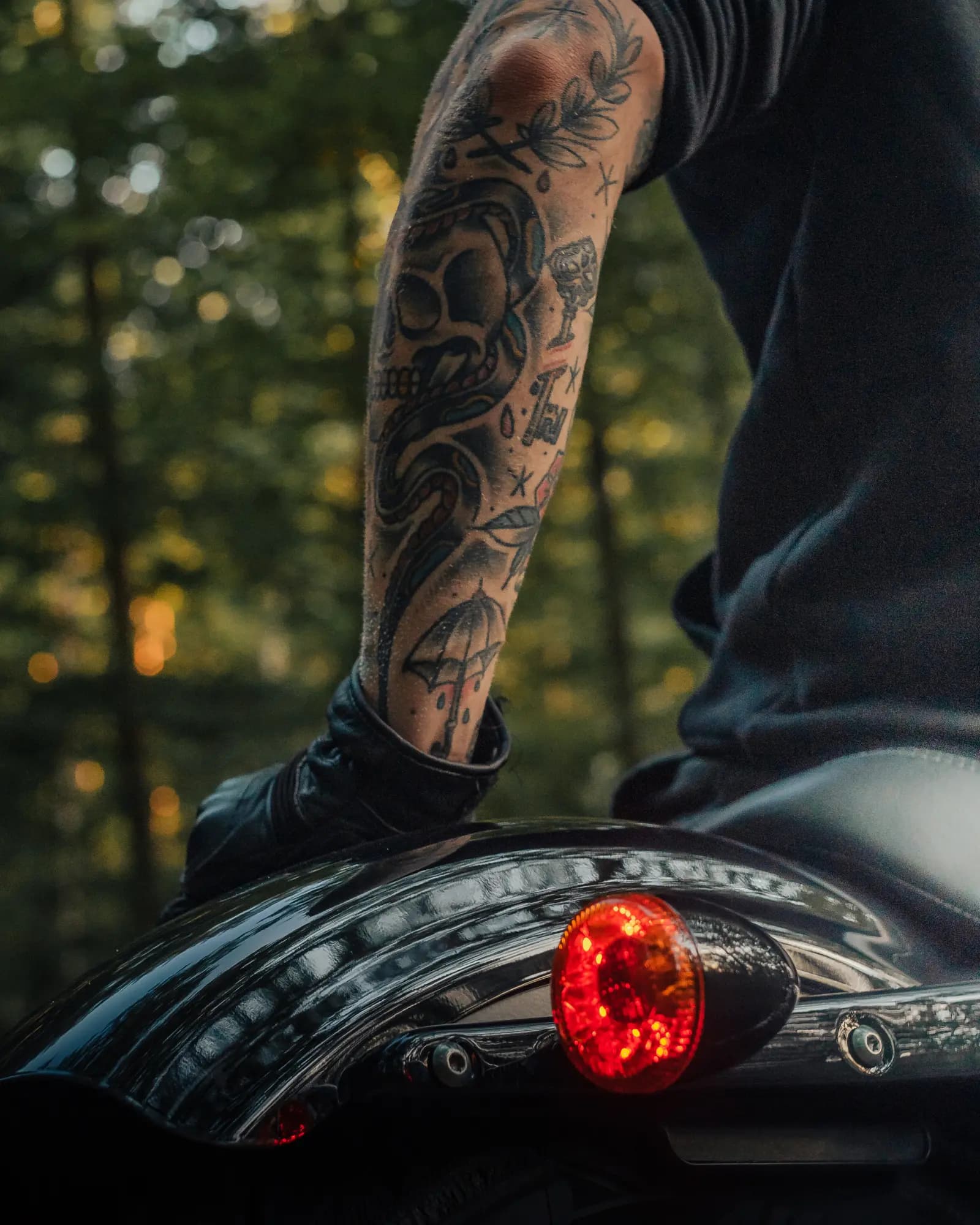 Close detail photograph of a rider on a motorcycle